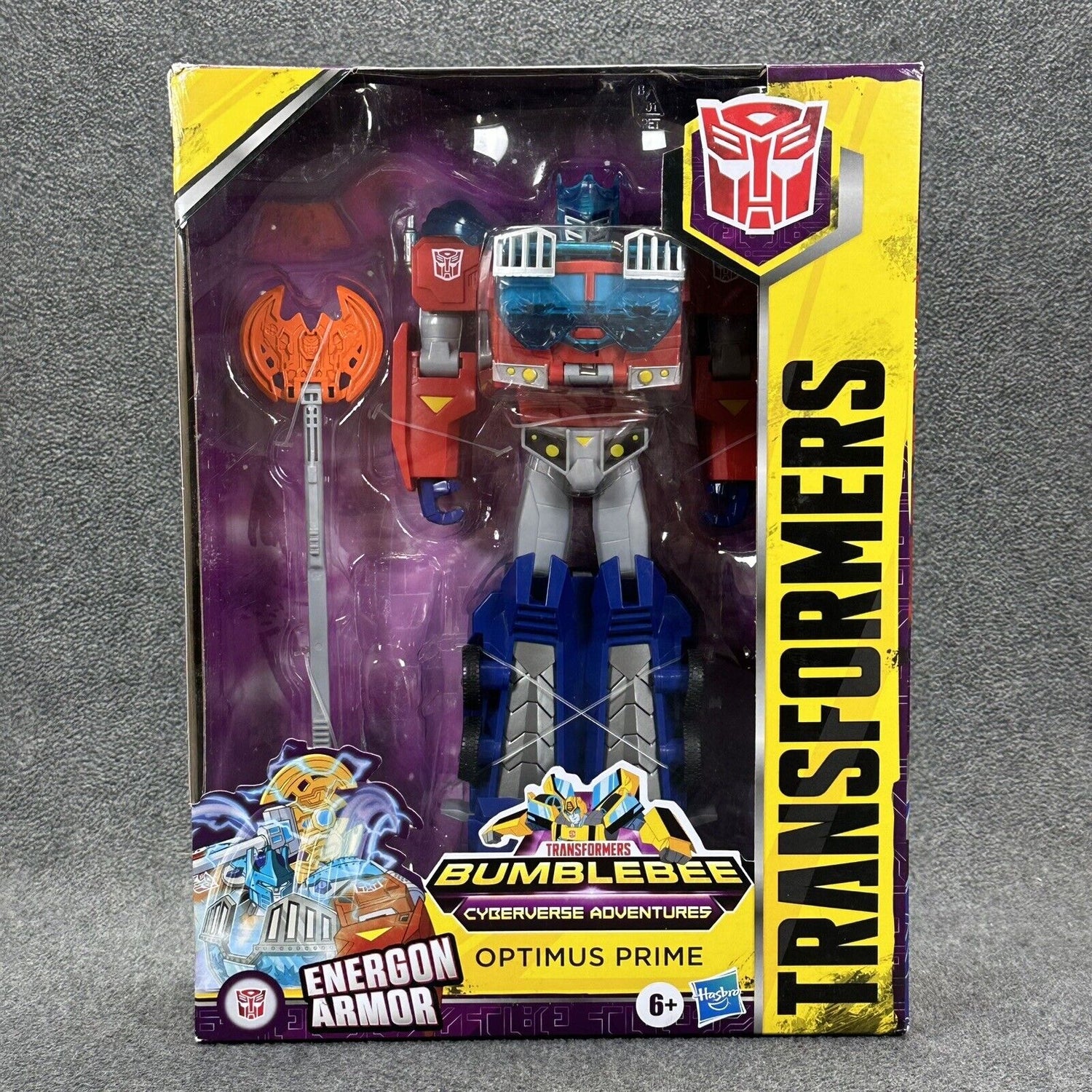 Transformers Bumblebee Cyberverse Adventures Optimus Prime action figure with Energon Armor in original packaging, suitable for ages 6 and up.