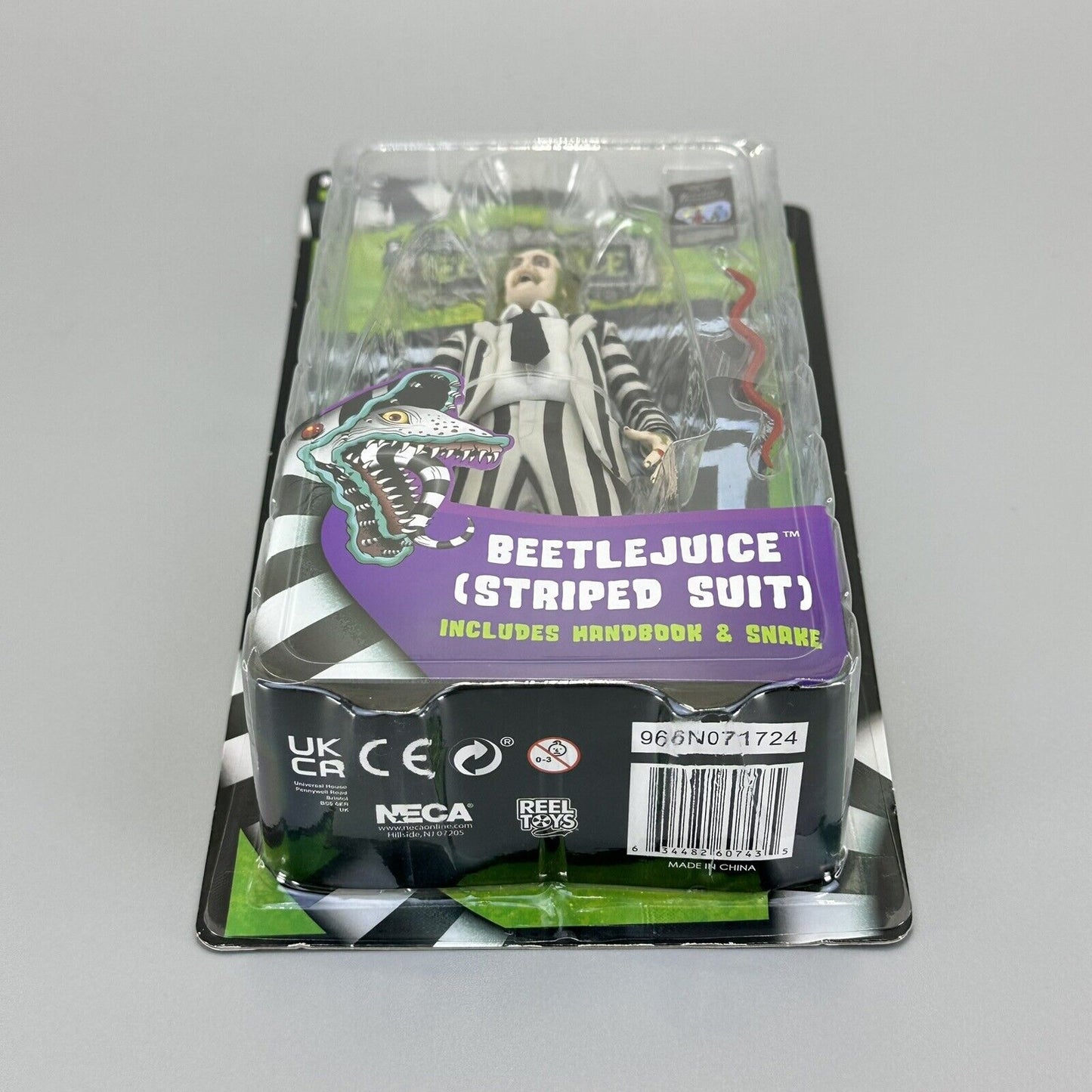 NECA Beetlejuice Striped Suit 7" Action Figure w/Handbook For Deceased & Snake